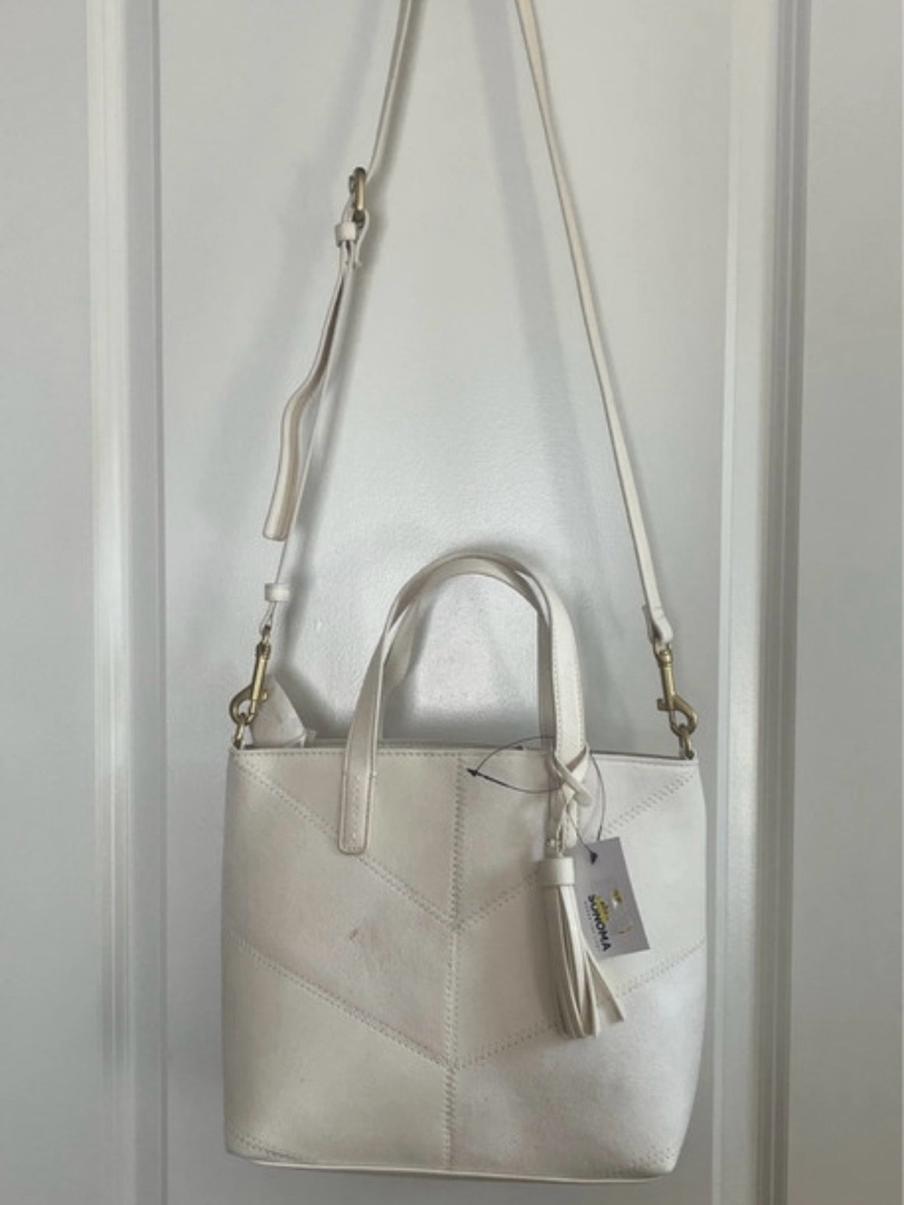 Sonoma Cream Leather Crossbody Tote with Tassel Accent